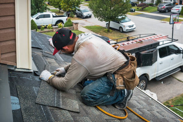 Professional Roof Replacement technician working in Pledger, TX